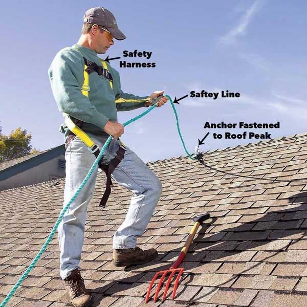 Inspecting shingles during roof inspection services in Rocky Point, NC