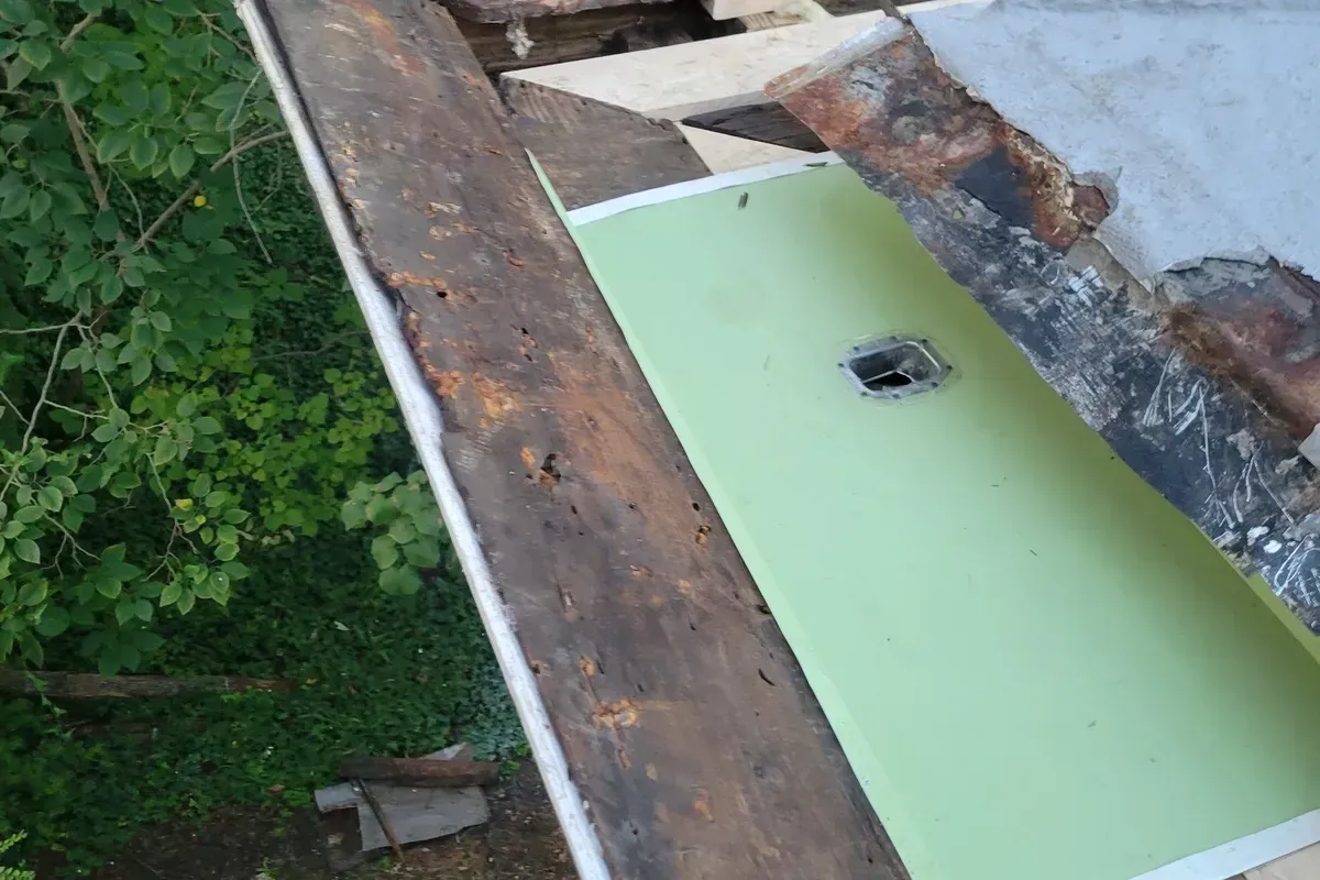 Custom bent pan for repairing the built in gutter on old historic building in Wilmington, NC.