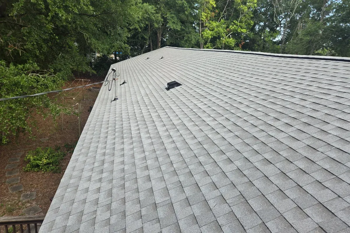 Nice crisp straight lines on new roof replacement in Carolina Beach, NC with improved ventilation system.
