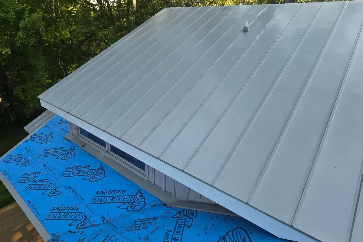 Snap lock standing seam metal roofing system installed on the old rail road station in Castle Hayne, NC turned into home.