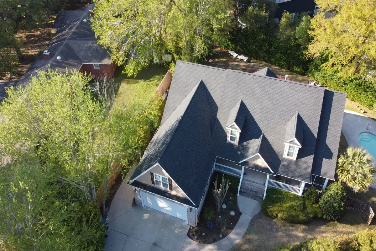 Full roof replacement with architectural shingles in coastal North Carolina.