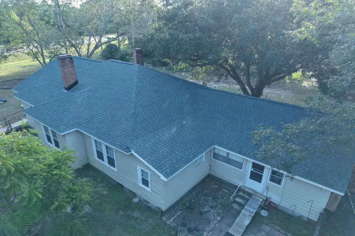 Drone view of completed asphalt shingle roofing project.