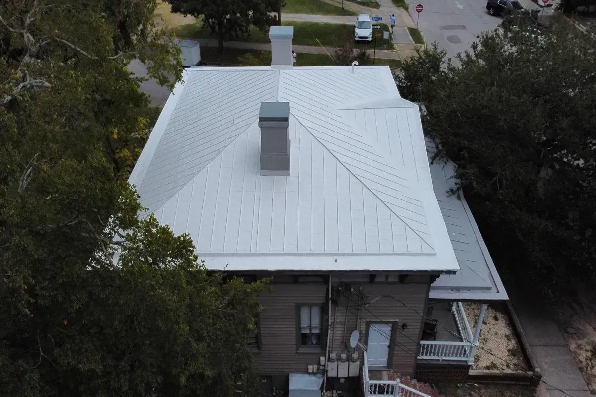 Gaf roof coating installation on apartment building. 