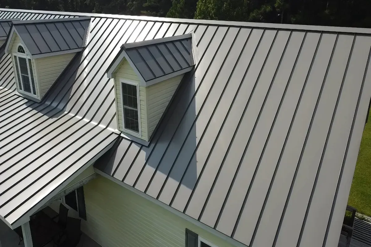 Standing seam metal roof installation on residential home.