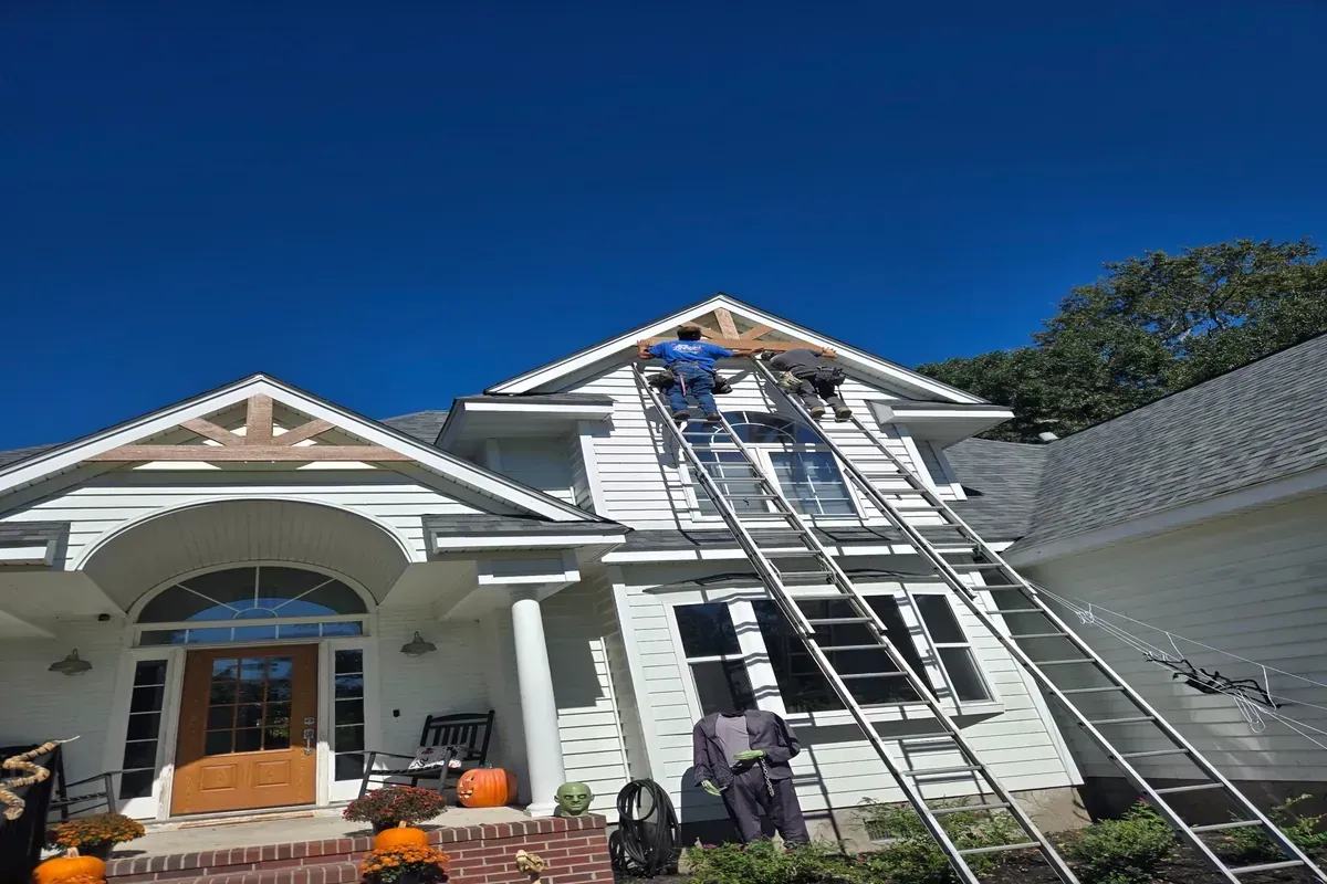 Siding repair and exterior maintenance in progress