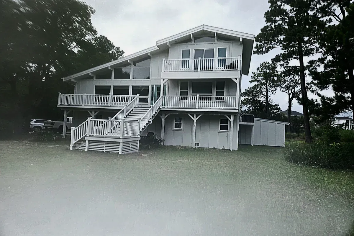 Residential siding installation on coastal home with balconies