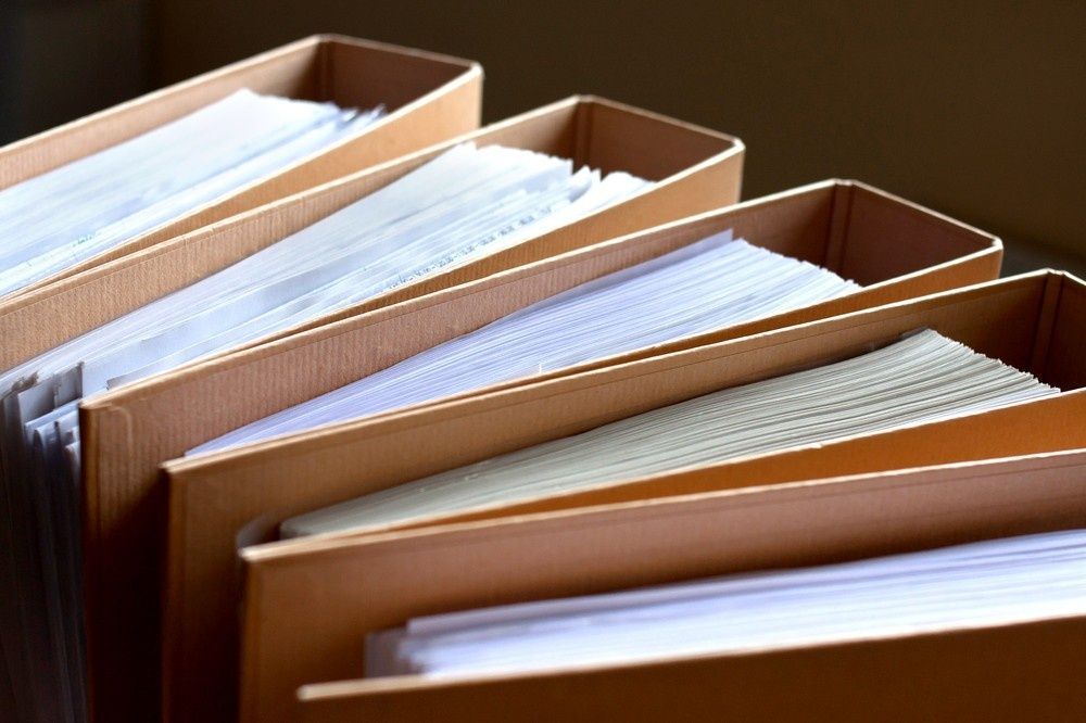 Four Open File Folders with White Papers Inside, Arranged Side-By-Side — Books in a Mess Australia in Wyong, NSW