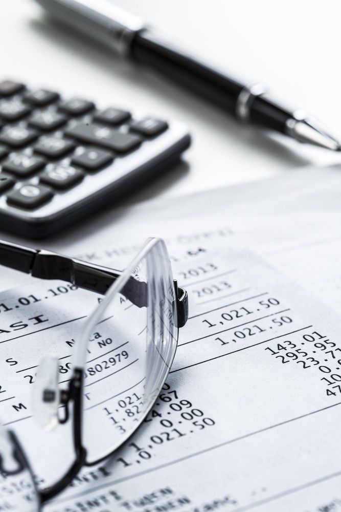 Close-Up of A Calculator, Pen, Eyeglasses, and Financial Documents — Books in a Mess Australia in Peats Ridge, NSW