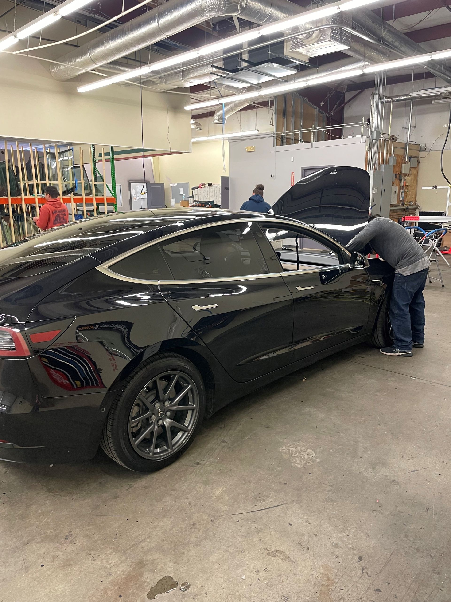 Broken Windshield on a Tesla Being Replaced With a New Windshield in Snellville, GA