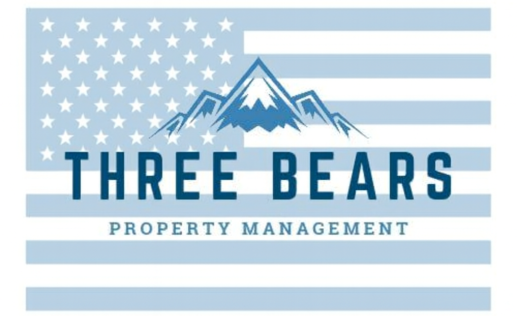 Logo for Three Bears Property Management: mountains and text over a stylized American flag.