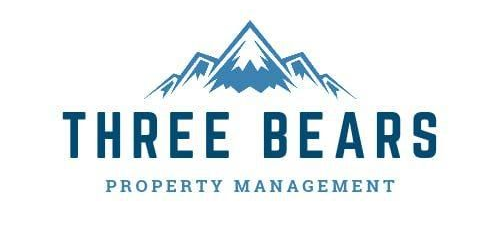 Logo of Three Bears Property Management, featuring blue mountain graphic above text.