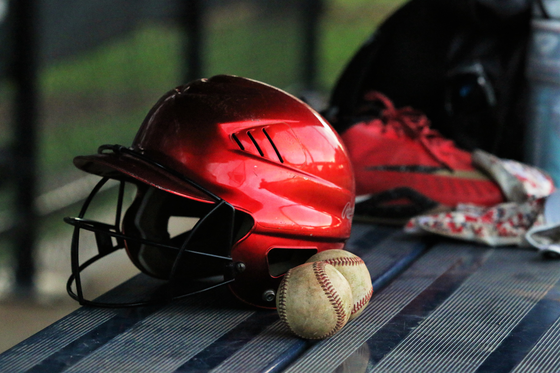 Two Baseballs & a Helmet. Plan a Game at Ballparks Central in Boonville, MO.