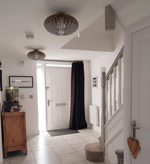 White hallway entrance and staircase painted by Painters and Decorators Glasgow