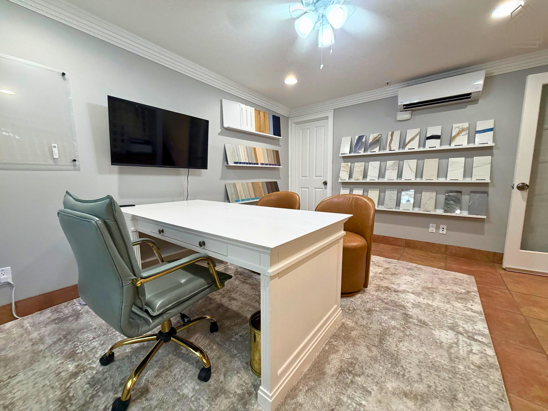 Tampa remodeling showroom featuring cabinet, countertop, and flooring samples, for kitchen and bathroom renovations.
