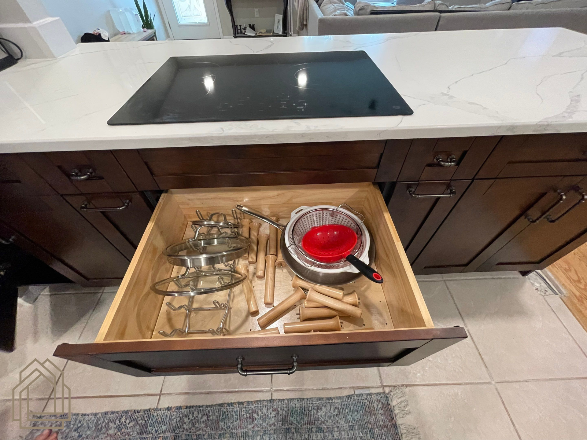 drawer organization
deep storage drawers
kitchen storage solutions
custom cabinetry features
pot and pan storage
kitchen organization
cabinet accessories
custom cabinet upgrades