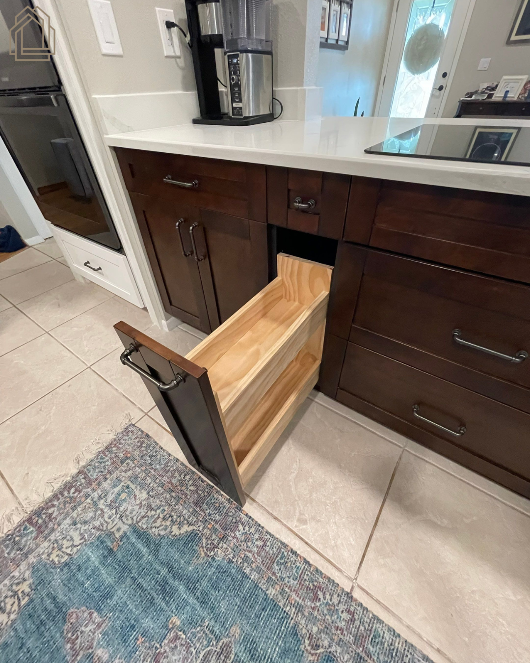 pull out spice rack
kitchen cabinet accessories
kitchen organization
storage solutions
custom cabinetry
cabinet upgrades
pull out storage
kitchen remodel