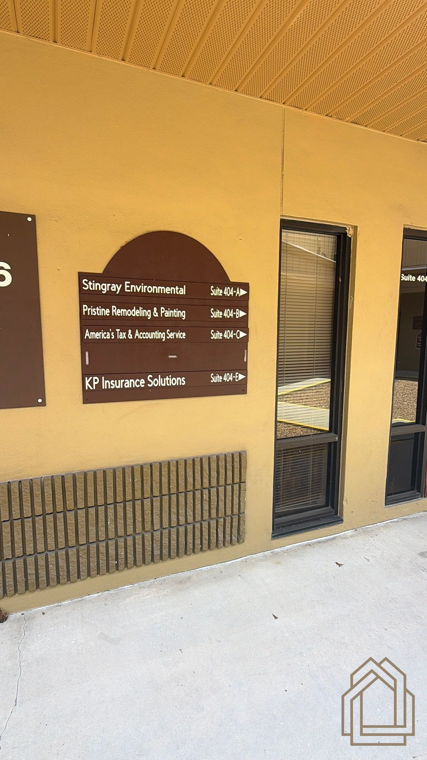 Pristine Remodeling South Lakeland office entrance and sign for kitchen, bathroom, and home remodeling consultations.