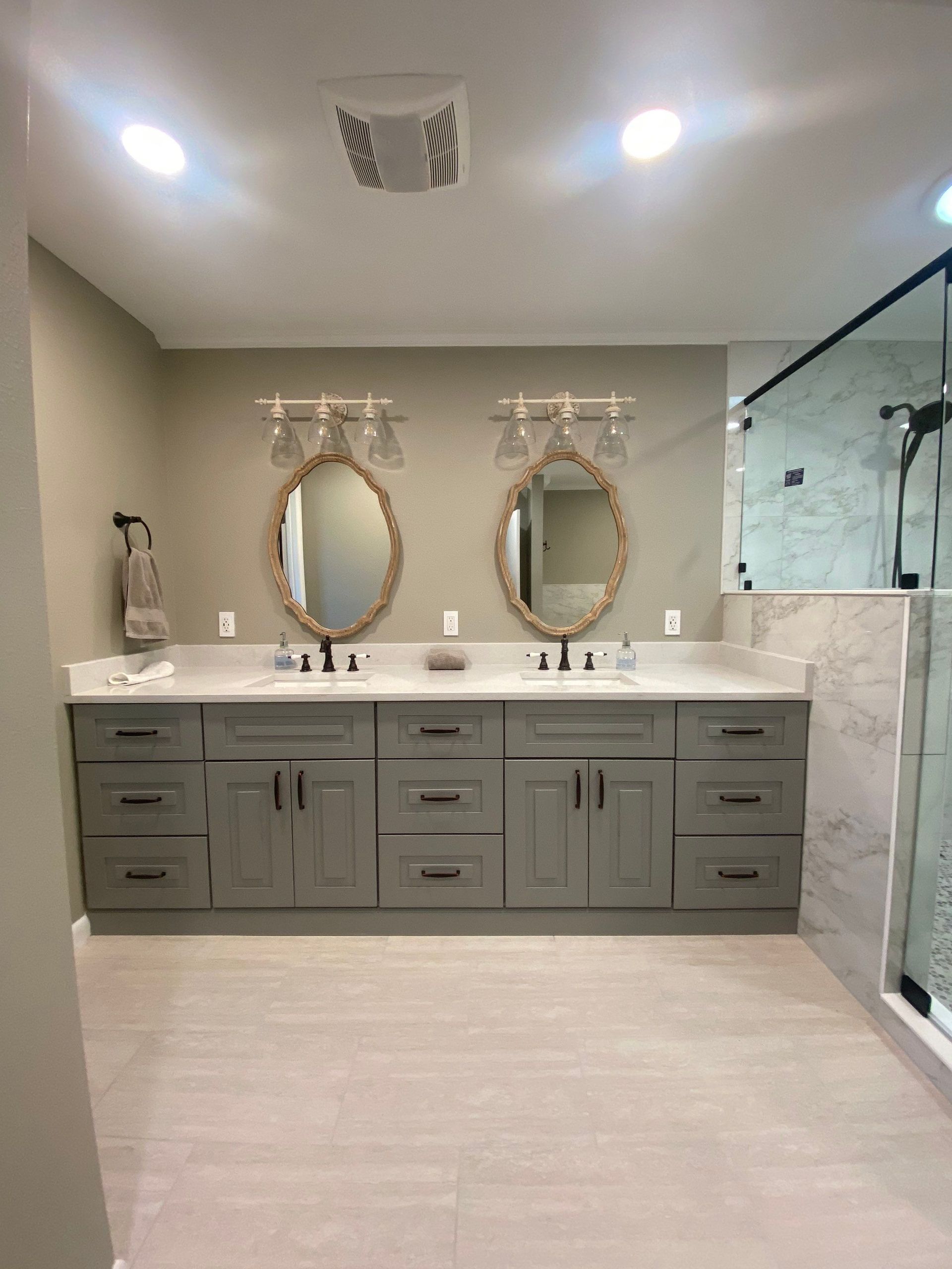 bathroom vanity cabinets
double sink vanity
custom bathroom cabinetry
bathroom storage solutions
shaker vanity cabinets
bathroom remodeling
custom cabinet installation
luxury bathroom design