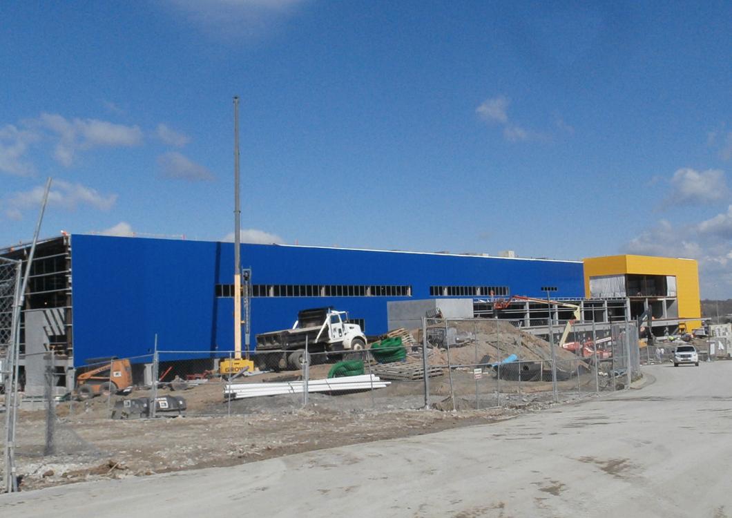 Dayco team working alongside construction site to paint .