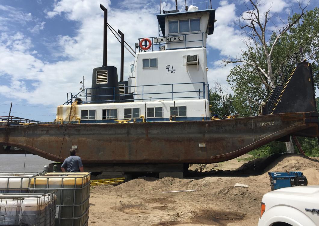 Distanced shot of boat freshly painted