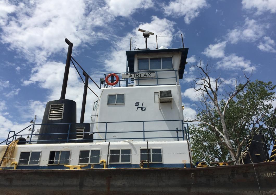 Bight white boat after receiving fresh paint by Dayco.