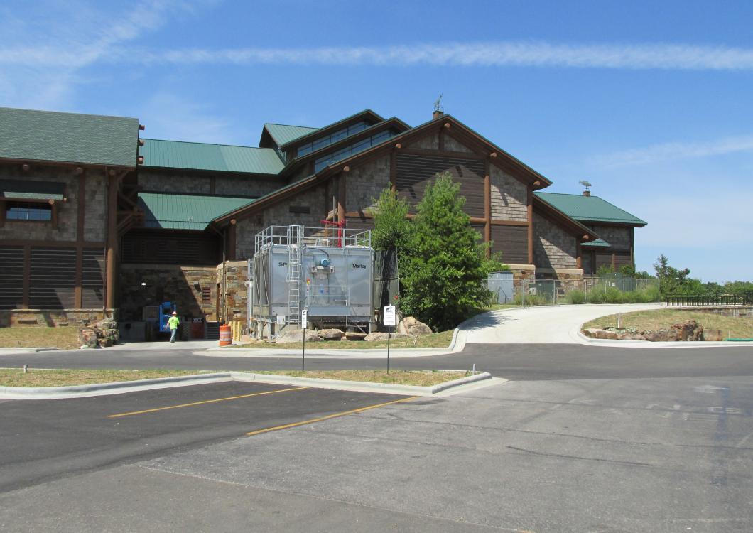 Dayco's team walking inside local business to finish painting project.