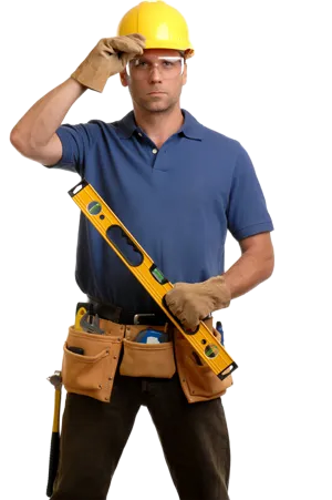 Construction worker in a blue shirt and hard hat, holding a level and tool belt.