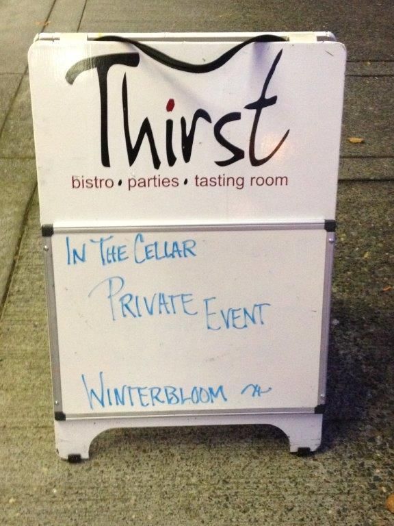 White sandwich board sign for 