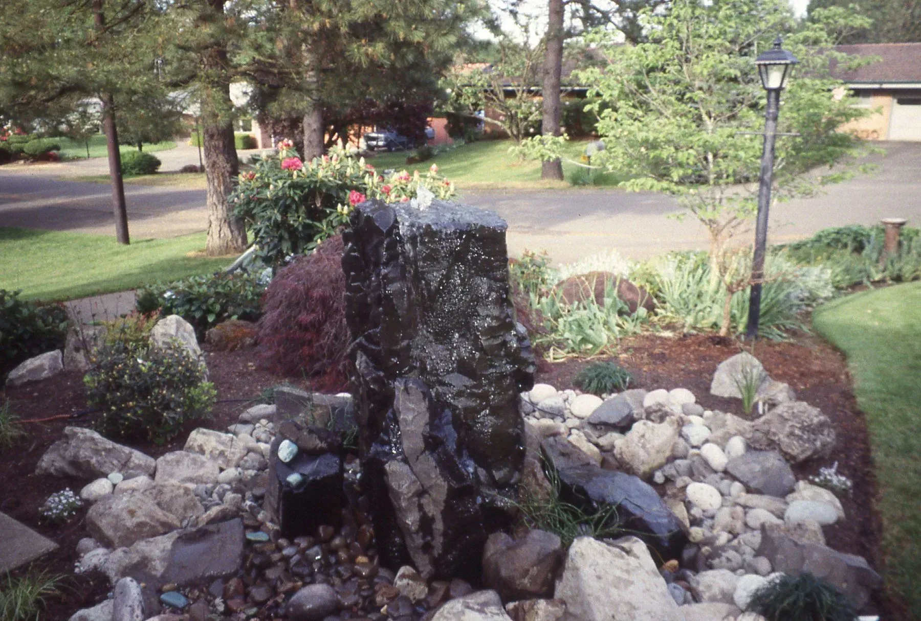 Water fountain feature in a residential garden.