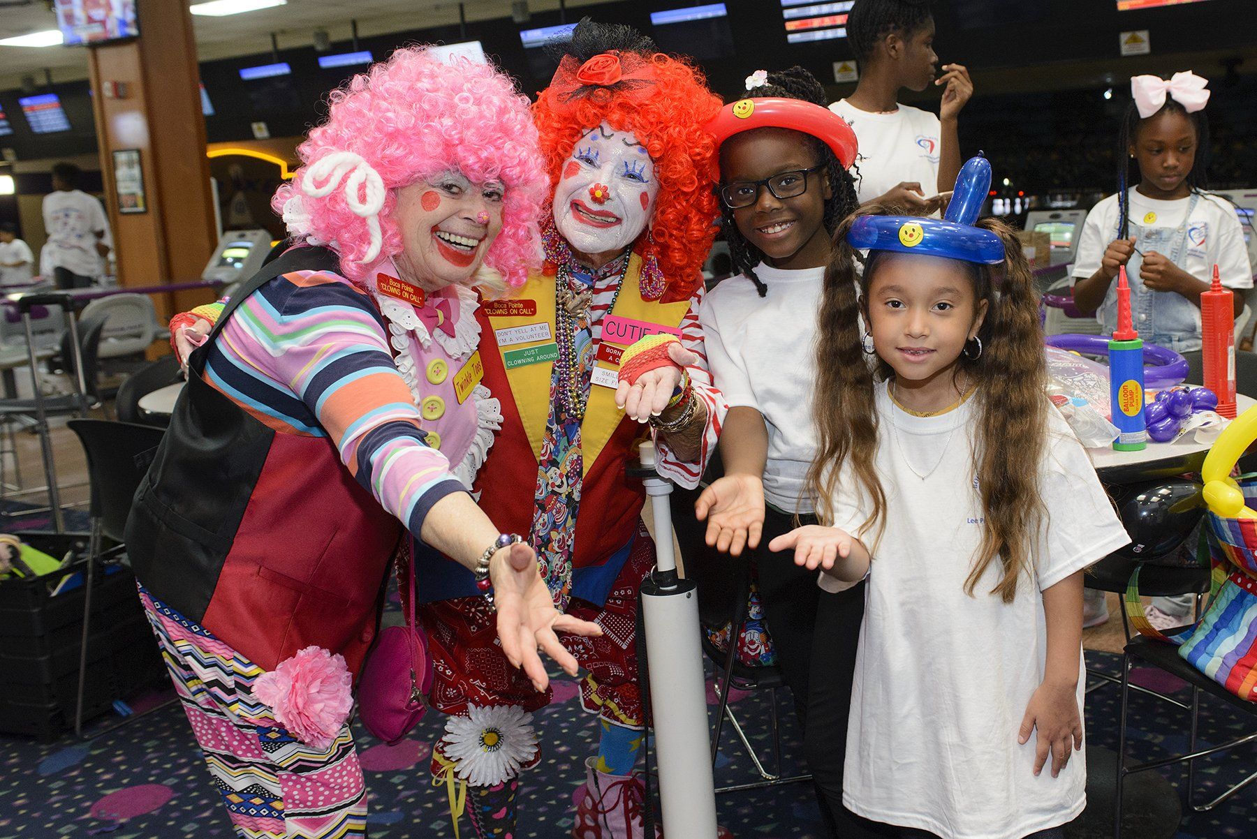 Clowns on Call's Twinkle Toes and Cutie Pie with Adreane Meance and Lillian Winston at the Bowling for Bread fundraiser.