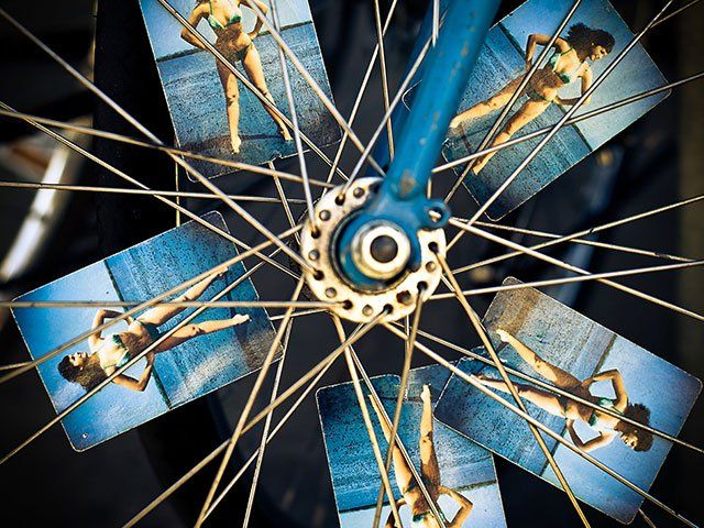Five of the same photograph in bicycle wheel