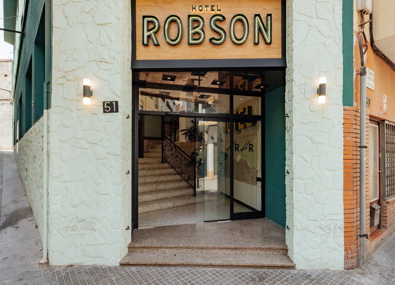 A building with a sign that says robson on it