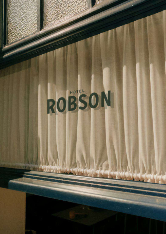 The word robson is on a white curtain