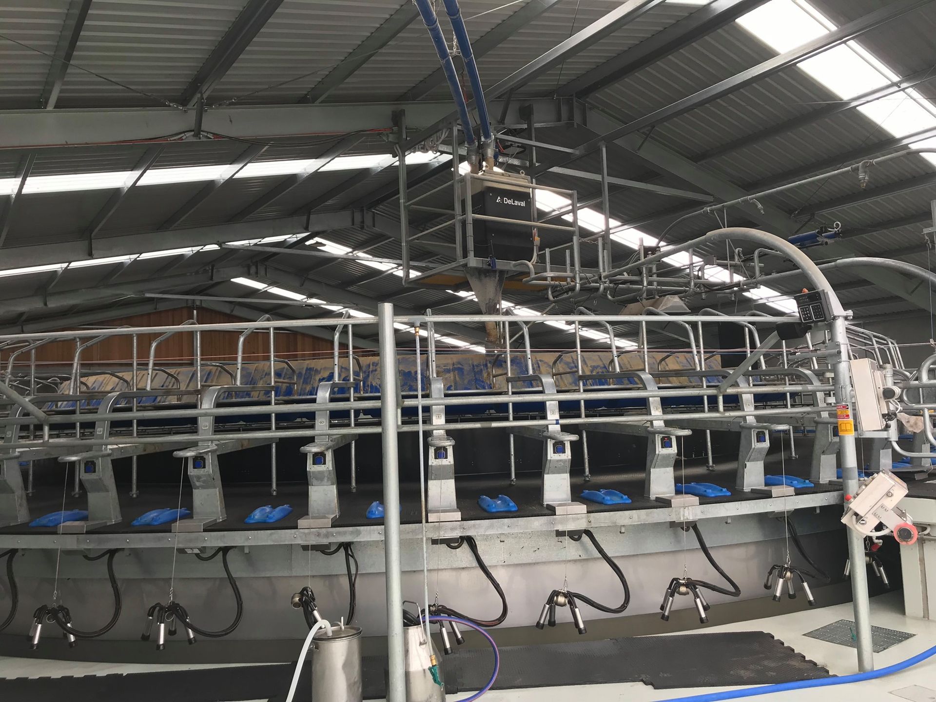 A dairy farm with a lot of milking machines