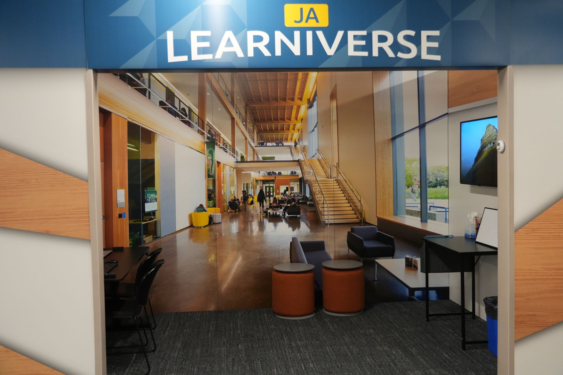 A room with a sign that says learniverse on it