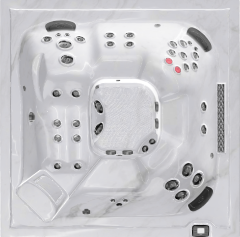 Un jacuzzi blanc avec beaucoup de boutons dessus.