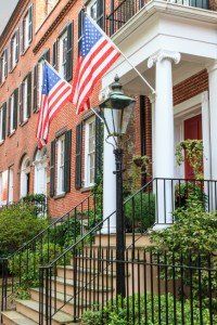Colonial Brick Architecture with American Flags