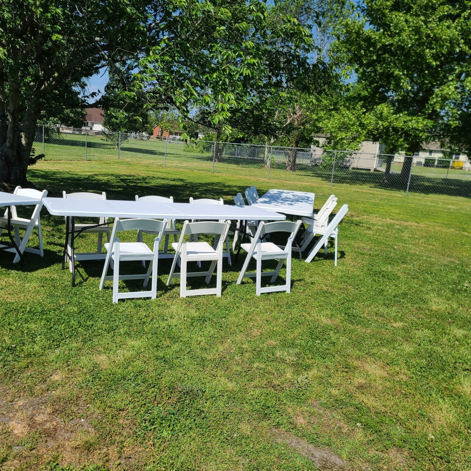 White folding chairs ━ Elizabeth City, NC ━ Brothers Tables & Chairs