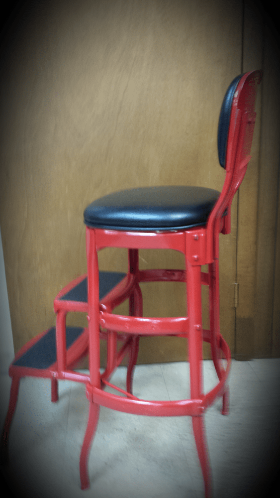 Vintage step stool. Newly painted surface. Created upolstered seat & back. Install new step pads.