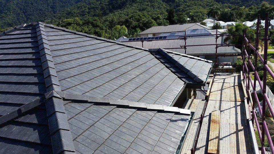 Roof of A House with Gray Tiles — High Performance Roof Tiling P/L in Kewarra Beach, QLD
