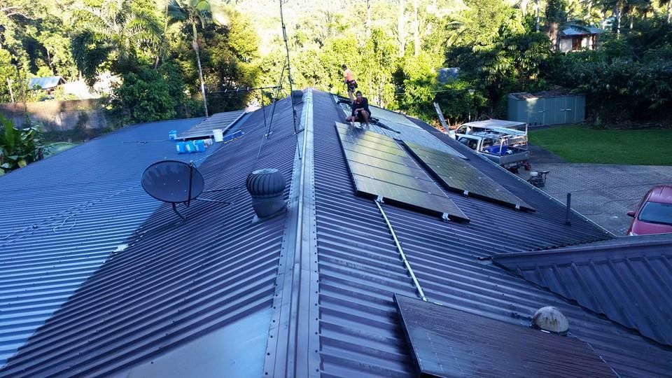 A Roof With a Lot of Solar Panels on It — High Performance Roof Tiling P/L in Kewarra Beach, QLD
