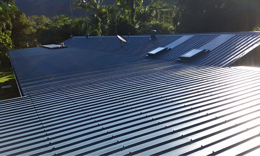 Close Up of a Roof With Trees in the Background — High Performance Roof Tiling P/L in Kewarra Beach, QLD