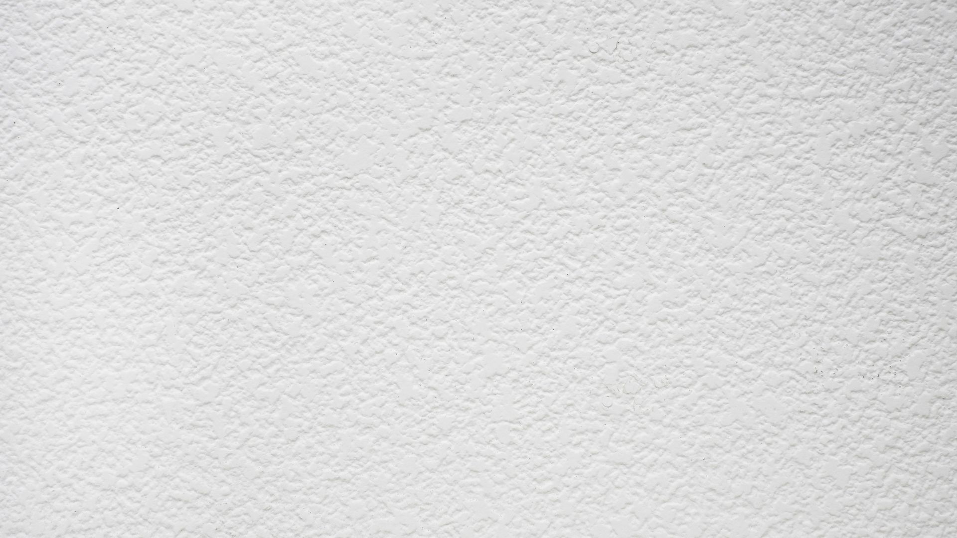 Light gray textured paper background with subtle diagonal pattern