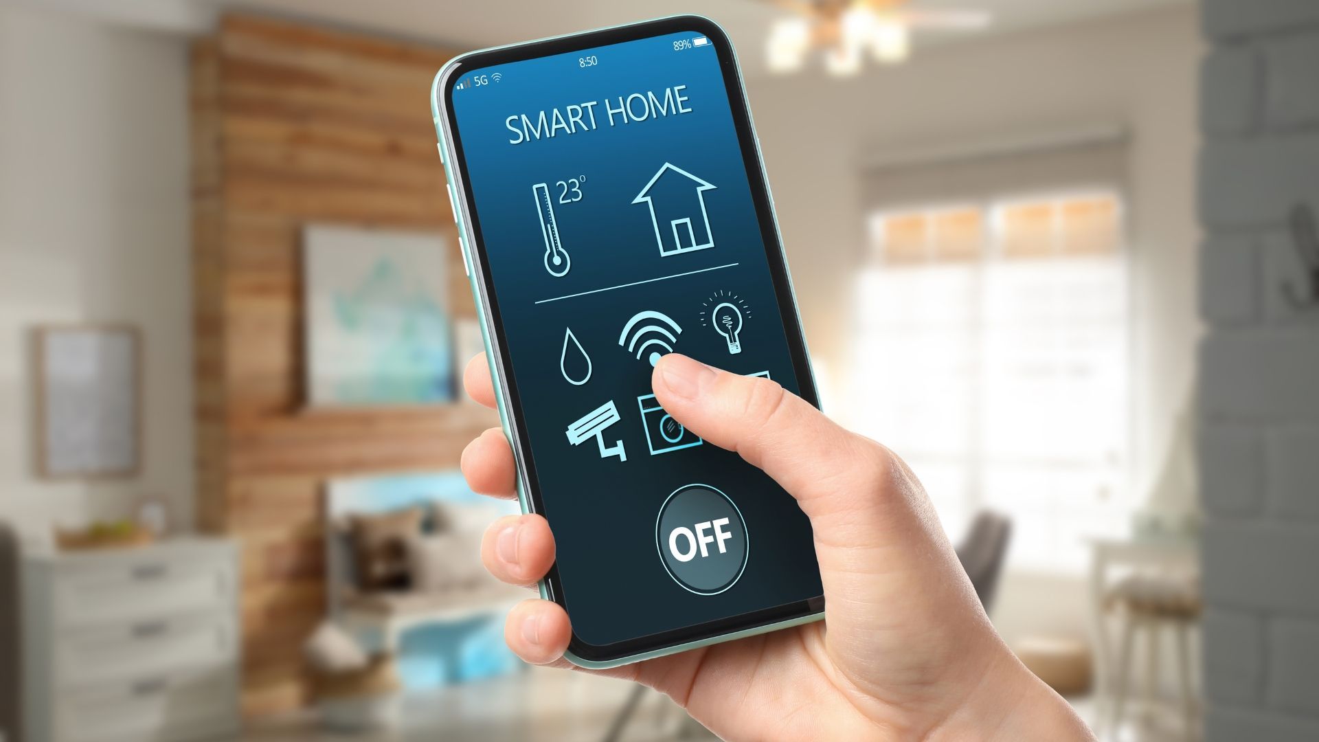 Hand holding a smartphone with smart home controls in a bright living room