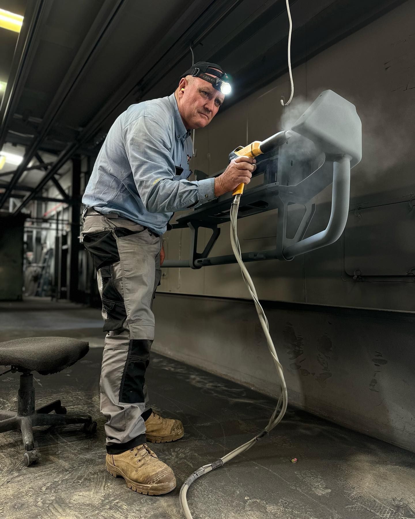 Man Spraying Metal Man Spraying Metal