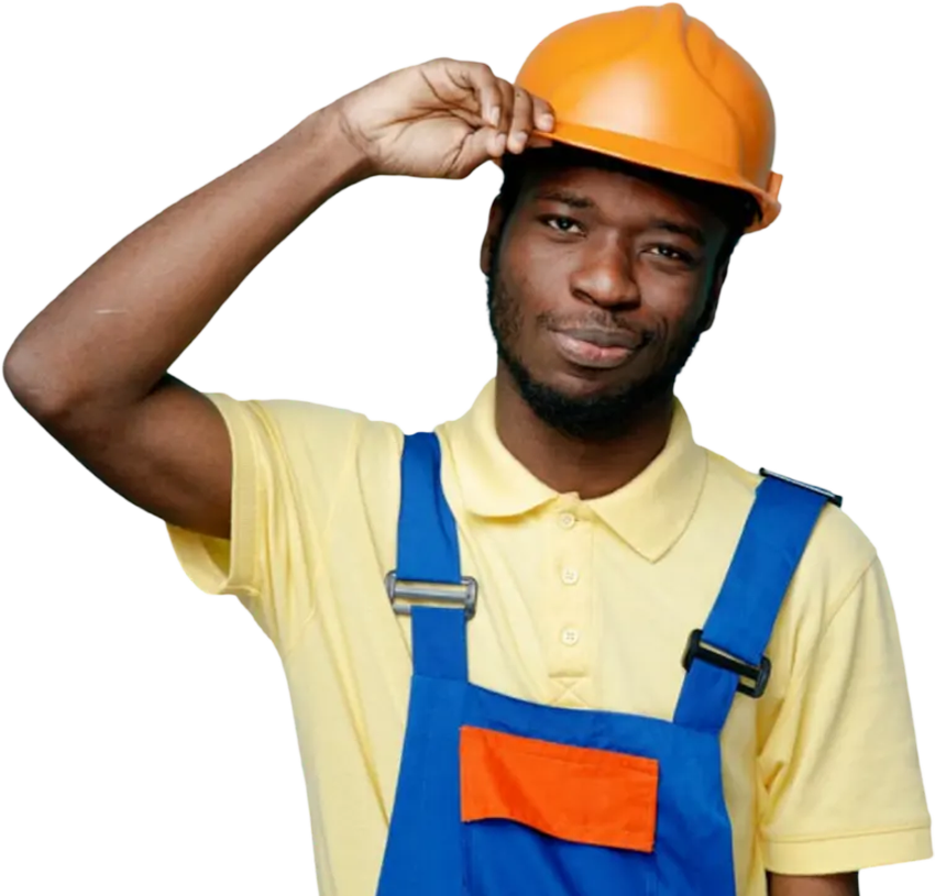 Person wearing a hardhat and work overalls