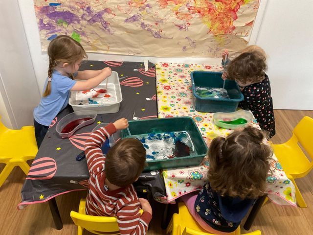 Children Engaging in Artistic Expression with Coloured Dye — Lilly Pilly Early Learning Centre