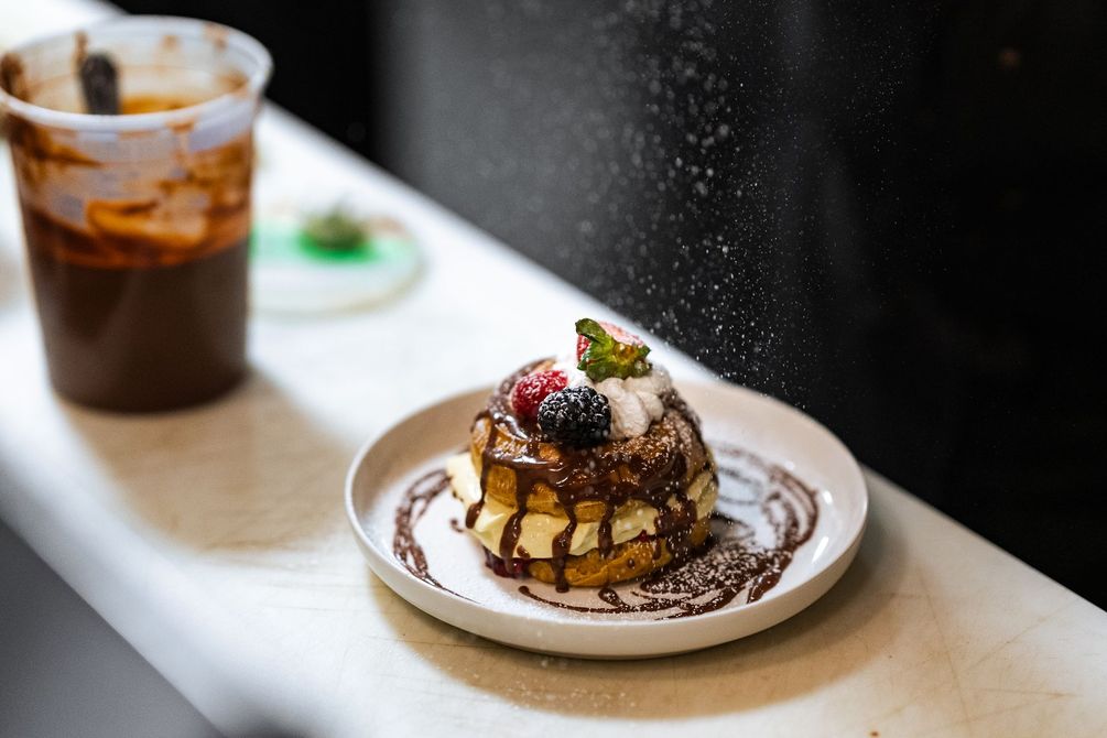 A close up of a dessert on a plate on a table.