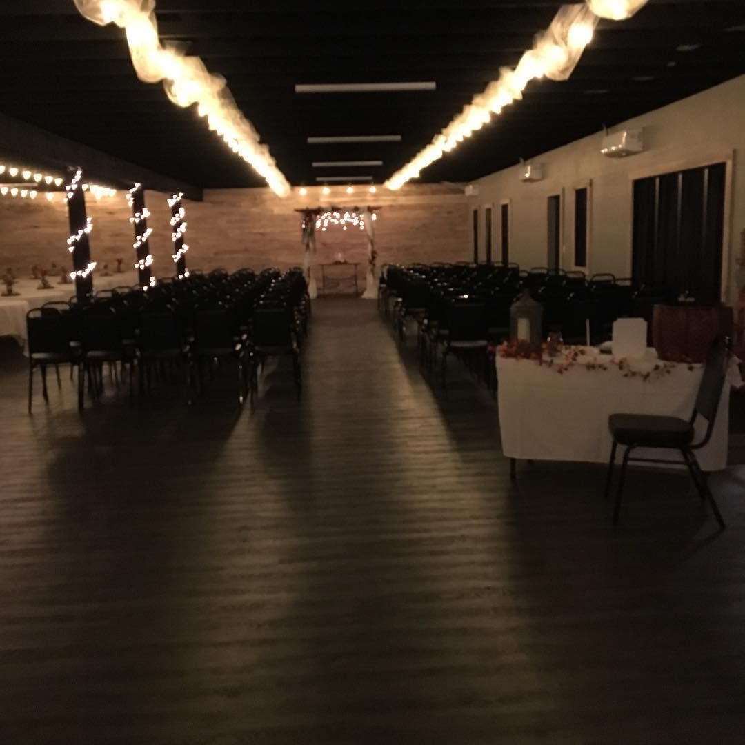 A large room with tables and chairs in it
