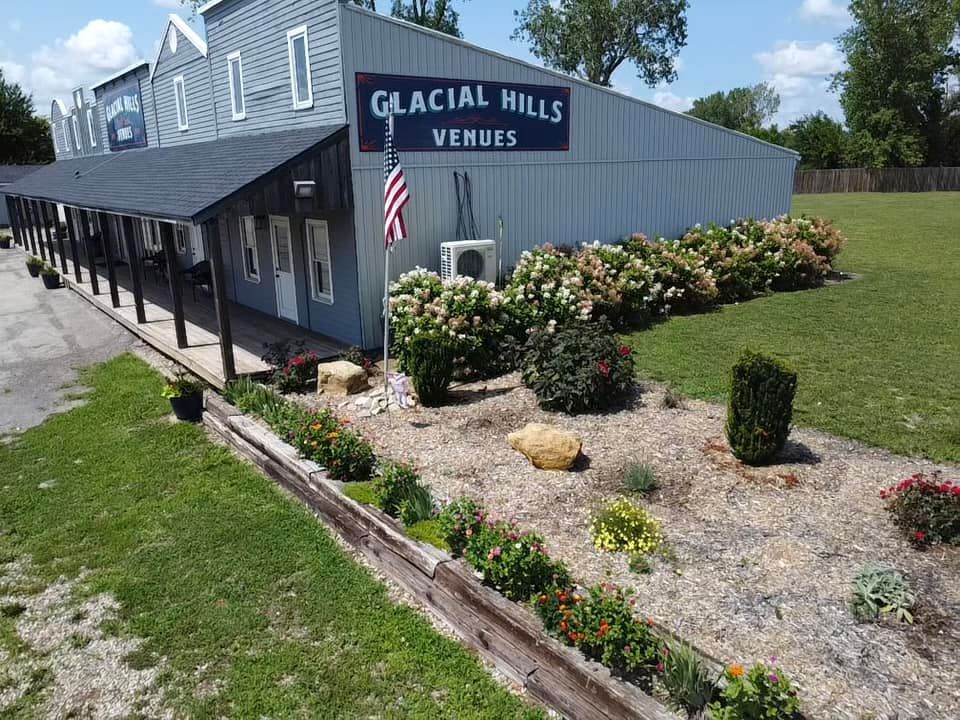 An aerial view of a building with a sign that says glacial hills venues.